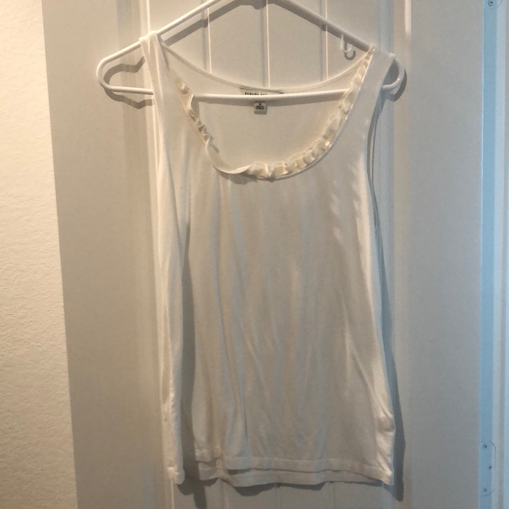 White Banana Republic tank with ruffle detail.
